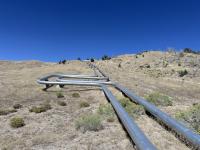 Geothermal powerplant pipes crossing over Utahs West Desert