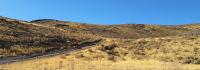 Top of ridge marks beginning of Queens Crown parcel 