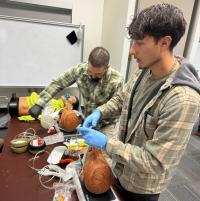 BLM firefighters participate in an airway management skill station at the National Advanced Fire and Rescue Resource institute in Tucson, Arizona. Photo by Dr. Drew, BLM. 