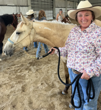 2024 Branded Bonanza trainer Nikki Herd is all smiles at the competition at the Ford Idaho Horse Park in Nampa.