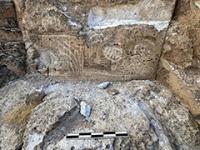 Damage to a petroglyph caused by cultural site vandalism.
