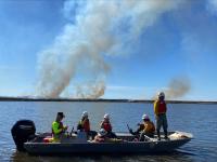 BLM and U.S. Fish and Wildlife Service staff observe the prescribed burn 
