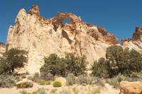 An arch high on a cliff wall in Grand Staircase-Escalante National Monument