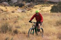 A man rides an e-bike on BLM-managed public lands in Western Colorado.