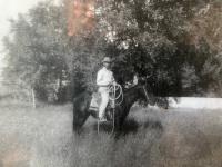 Man on a horse in a black and white photo