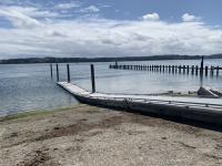 boat dock leading into the water 