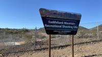 A trapezoid-shaped BLM sign that reads Saddleback Mountain Recreational Shooting Site