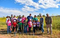 Members of Girl Scouts Troop 18044 and Bureau of Land Management staff pose for a photo during a National Public Lands Day cleanup event at the Bureau of Land Management Roswell Field Office’s Oxbow Day Use Area on Sept. 12.