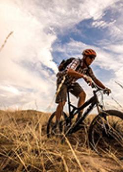 Mountain biker rides Discovery Hill Trail System