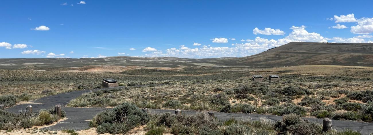 Scenic view of interpretive panels with Oregon Buttes in the background from parking area