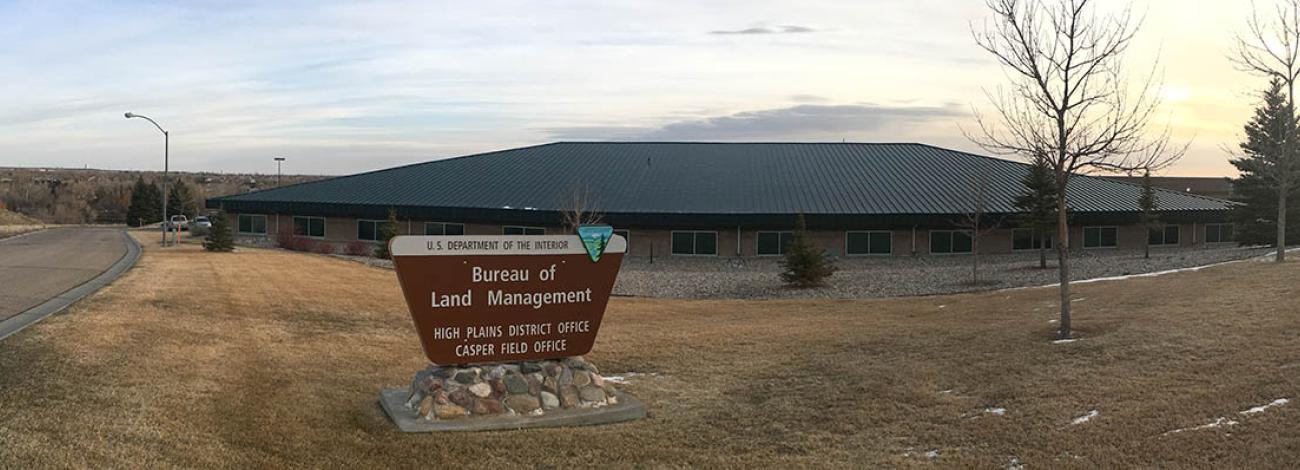 The sign leading to the parking lot of the Casper Field Office