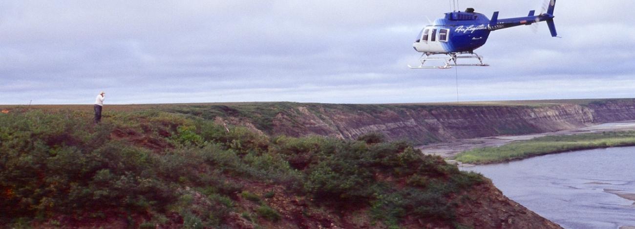 Helicopter approaches dig site where Dr. Anthony R. Fiorillo and his team have uncovered fossils which would be later identifed as Nanuqsaurus hoglundi. Photo courtesy of Dr. Anthony R. Fiorillo and the Museum of Nature and Science in Dallas.