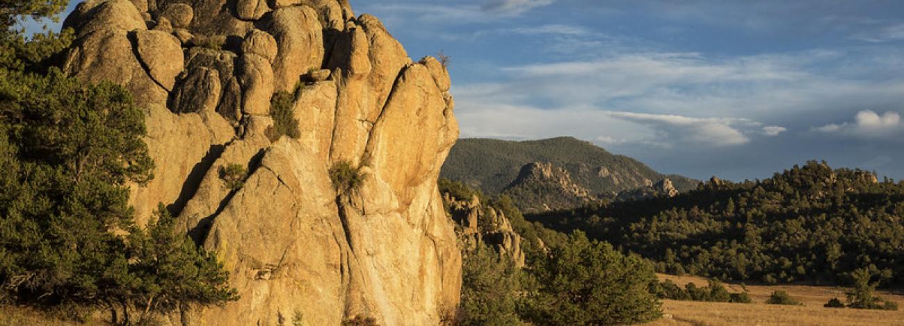 sunset over rock formation