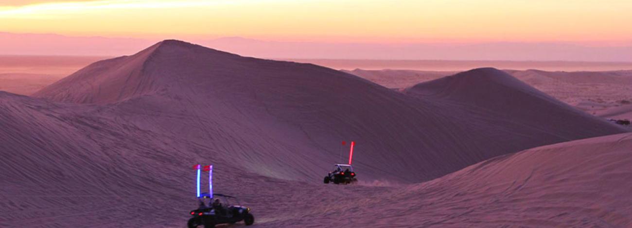 Two off-road dune buggies on the sand dunes.  Photo by BLM.