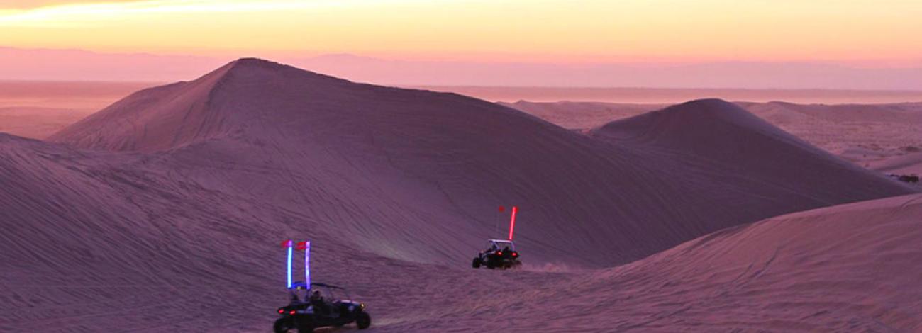 Two off-road dune buggies on the sand dunes. Photo by BLM.