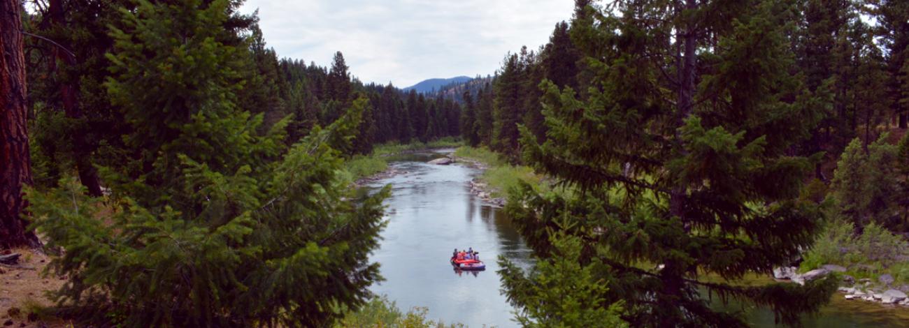 People rafting on river in Montana-Dakotas