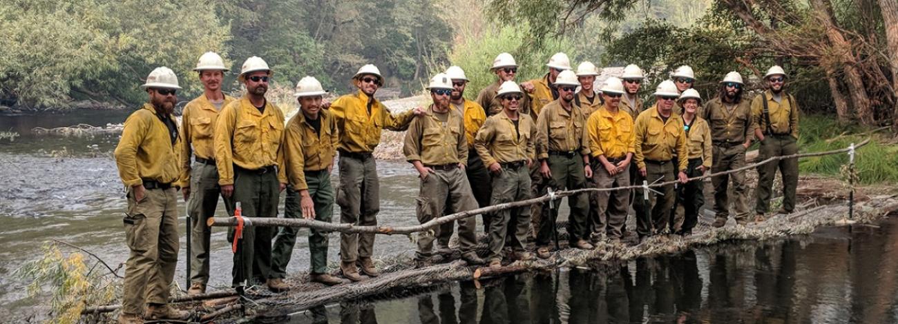 Aravaipa Crew on bridge over river