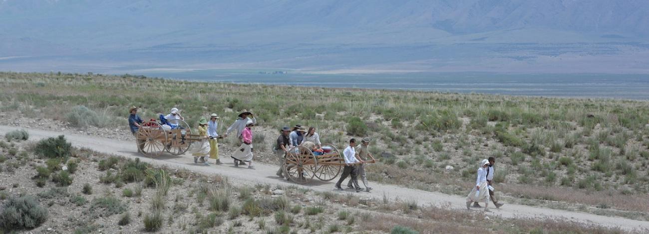 A hand cart trek along Mormon Trail in the west desert. Photo by Hannah Cowan.