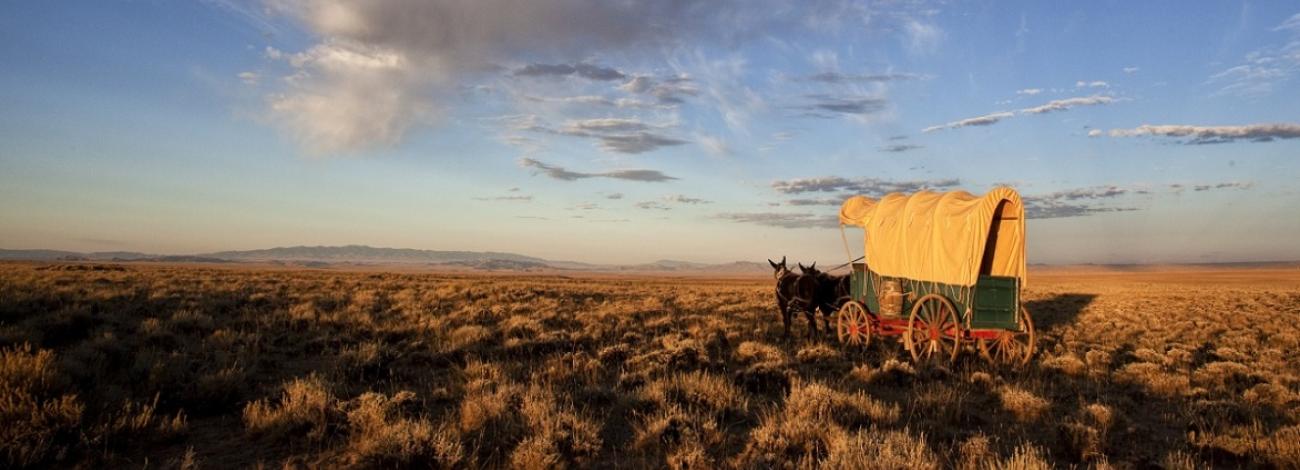 A wagon travels along the California and Oregon National Historic Trails in Wyoming.