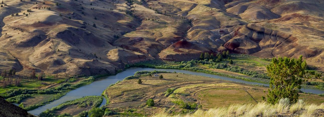 photo showing landscape with river running through it