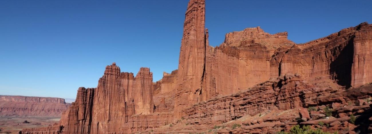 A picture containing valley, mountain, and canyon at Fish Towers. 