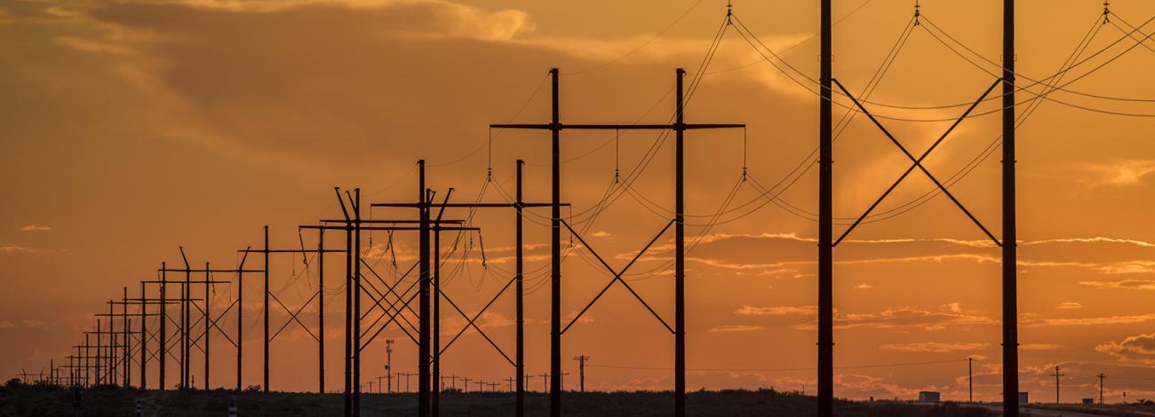 A transmission line at sunset in southern New Mexico.