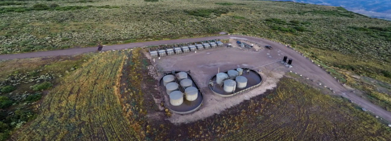 Aerial view of oil and gas infrastructure on landscape