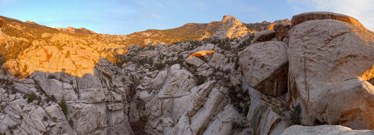 rocky boulders with some rays of sunshine beaming on the surface