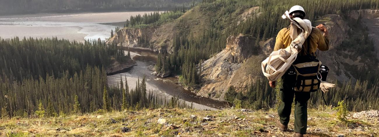 Wildland Firefighter overlooks a river