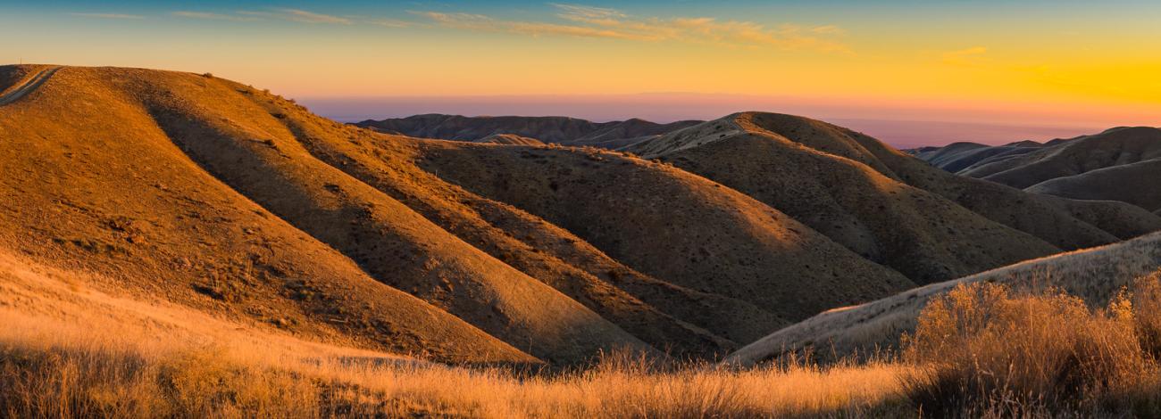Golden sunrise in Panoche Hills during winter. Hilltops over 2,500 feet high offering scenic vistas of the lush San Joaquin Valley.