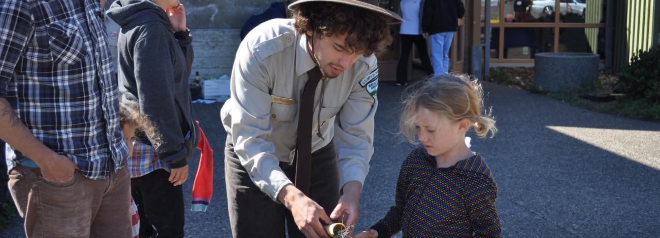 ranger teaching a child