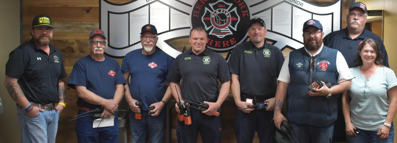 Officials from various rural fire departments receive radios from BLM through Rural Fire Readiness program 2025