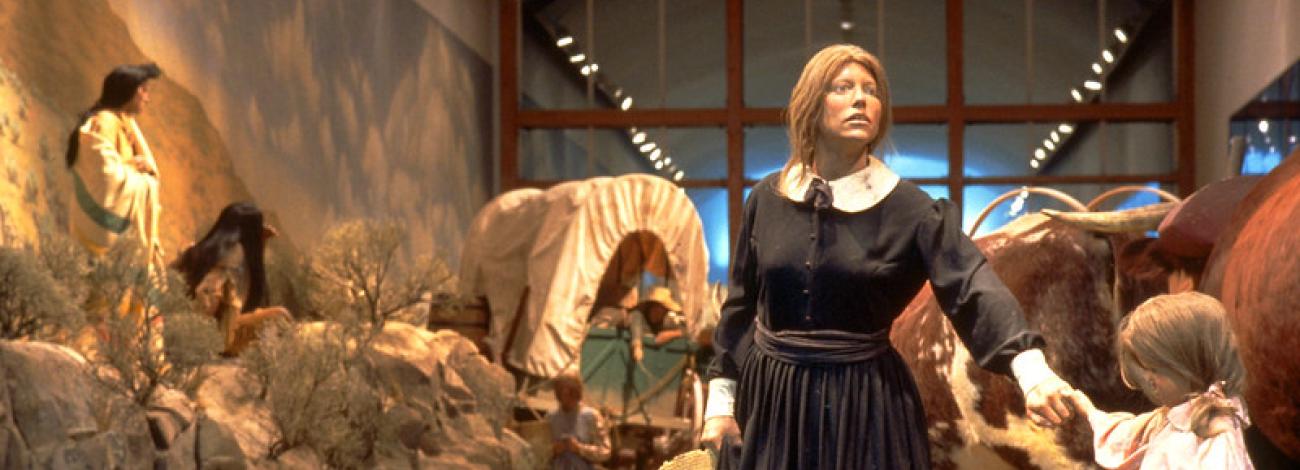 Diorama of Oregon Trail pioneer woman gazing into distance