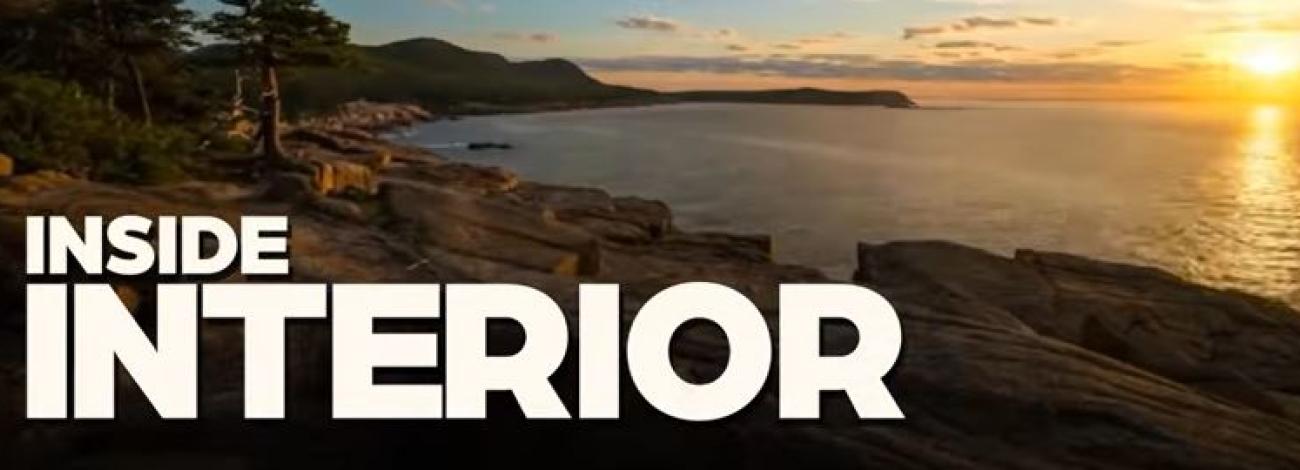 Inside interor text overlays a shorline at sunset.