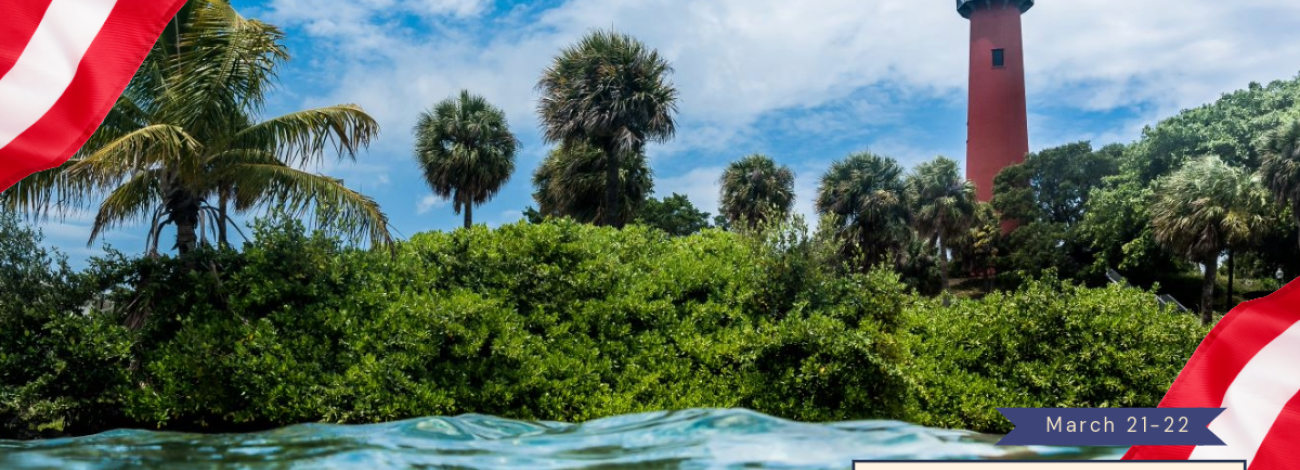 A vibrant scene showcasing a lighthouse surrounded by trees, with water in the foreground, promoting the River to Reef Art Festival on March 21-22.