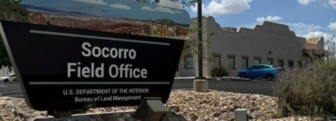 The portal sign in front of the BLM Socorro Field Office building.