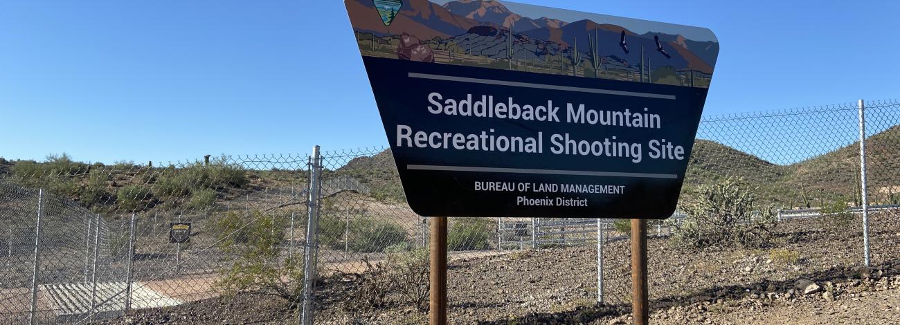 A trapezoid-shaped BLM sign that reads Saddleback Mountain Recreational Shooting Site