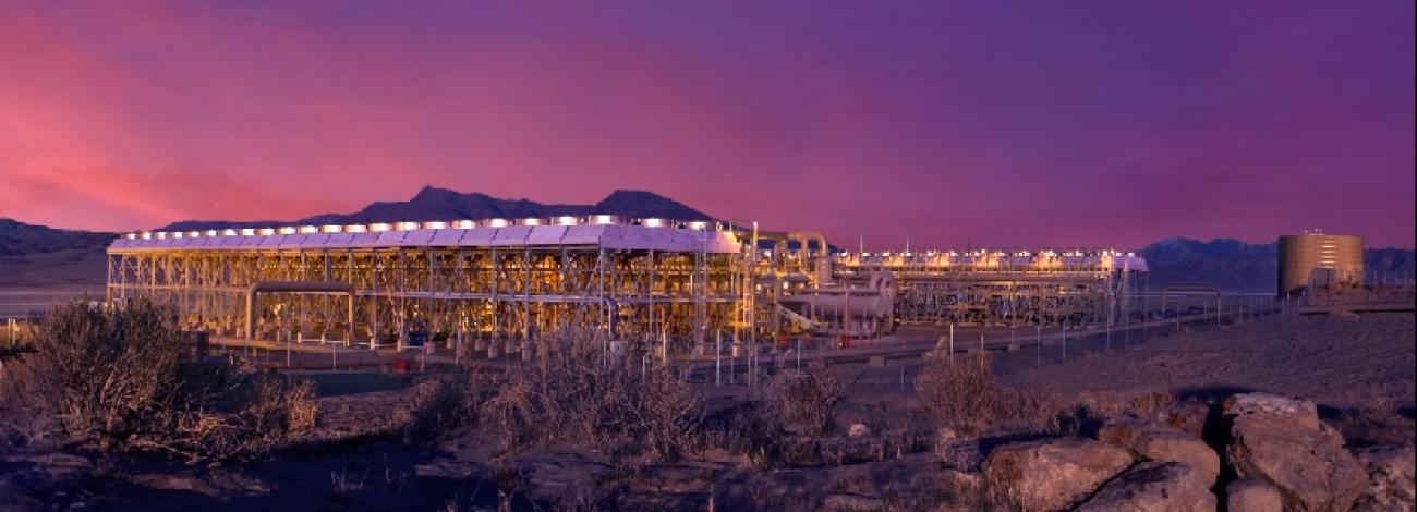Geothermal plant in the desert during sunset