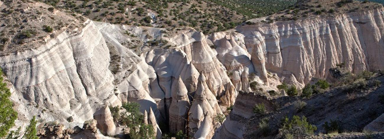 An aerial view of the cone-shaped tent rock formations at Kasha-Katuwe Tent Rocks National Monument.