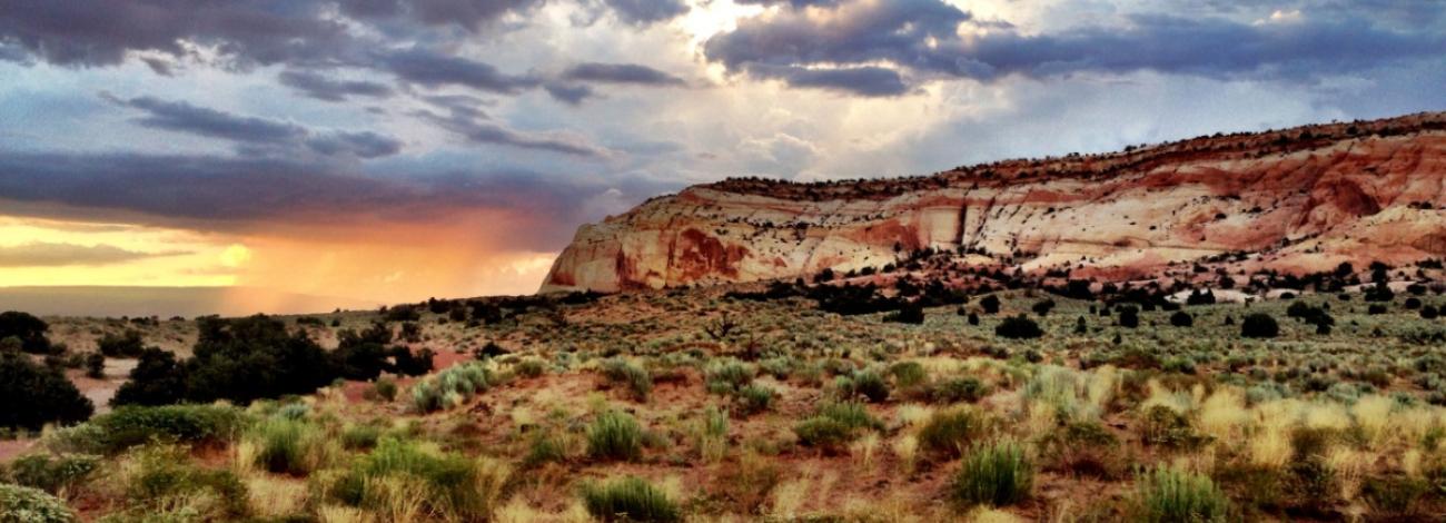 scenic view of grand staircase escalante with clouds over landscape