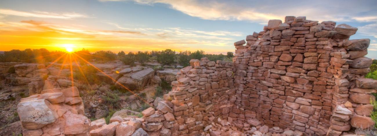 Ruins of ancient brick dwelling on ridge overlooking Canyons of the Ancients National Monument. 