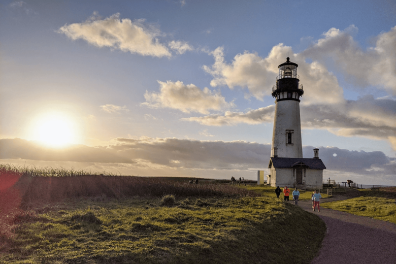 Children enjoy the last moments of sunshine at Yaquina Head Outstanding Natural Area, Feb. 16, 2020. Photo by Meredith Matherly