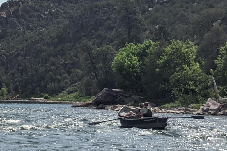 Boat floating down the Green River