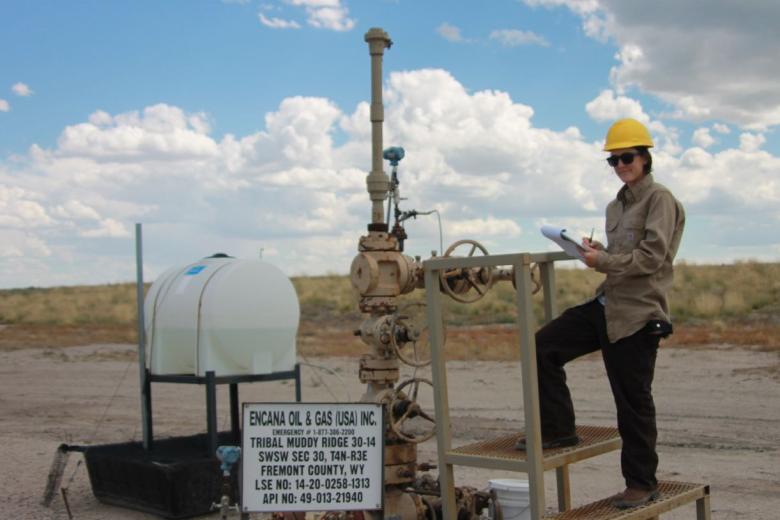 A BLM intern works at an oil and gas property in Fremont County, Wyoming in 2015.
