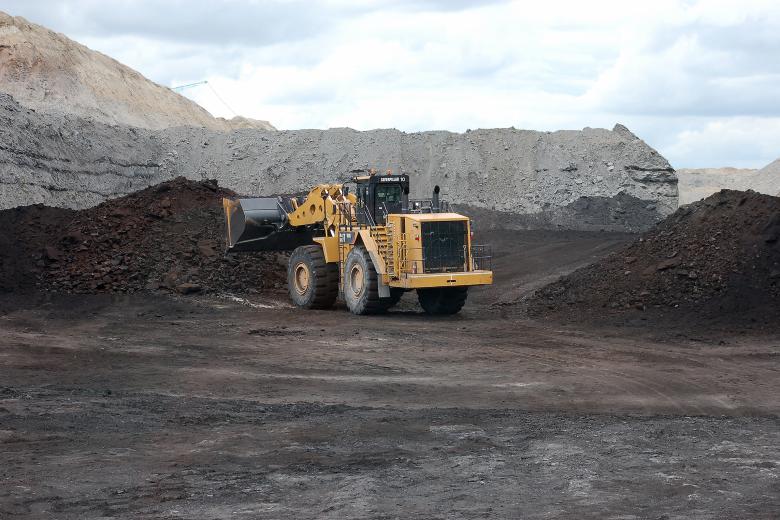 photo of construction equipment operating in a coal mine