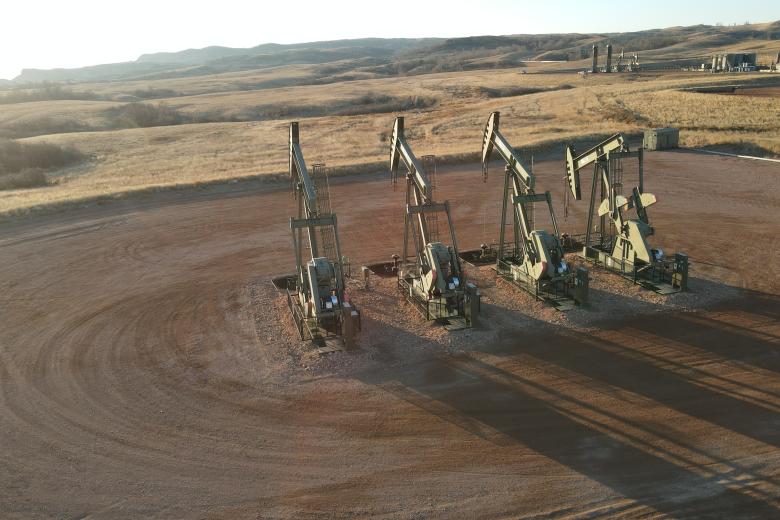 four pumps on an oil field