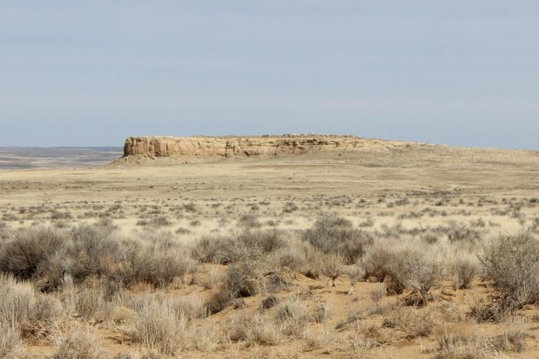 Distant mesa within the Chaco Withdrawal Area covered in desert landscape