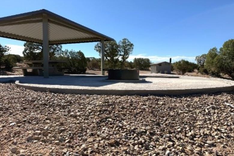 An accessible campsite with concrete pad and hangover. 