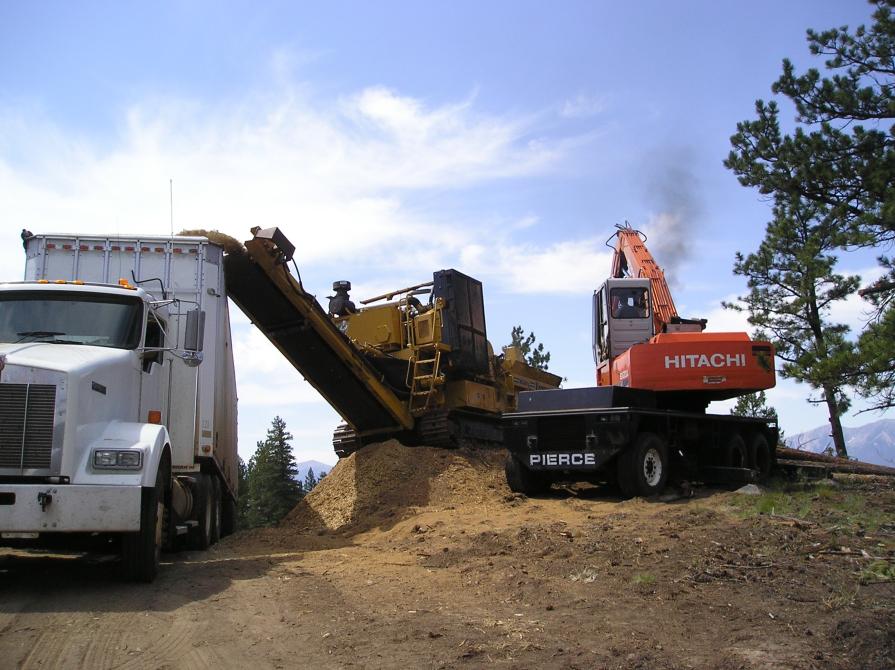 Woodchips being loaded into a chip van