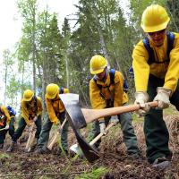 EFF crew lined up doing rehab work in Alaska